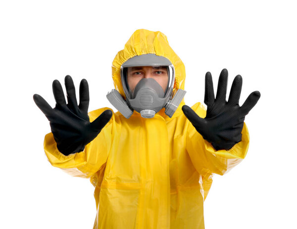 Man in chemical protective suit making stop gesture on white background. Virus research