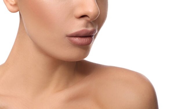 Woman with pink lipstick on white background, closeup