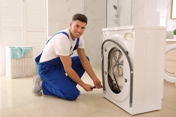 Professional Plumber Repairing Washing Machine Bathroom — 스톡 사진