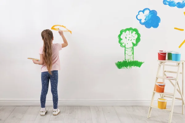 Little Child Painting White Wall Indoors — Stock Photo, Image