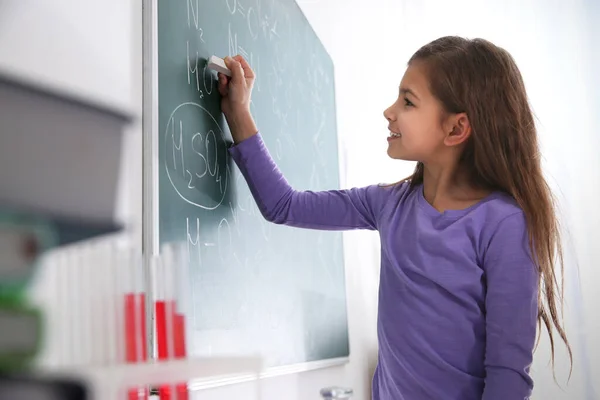 Schoolgirl Writing Chemical Formulas Chalkboard Classroom — Stock Photo, Image