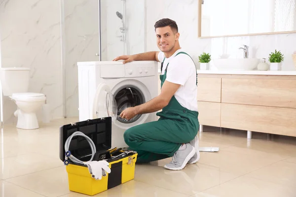 Professional Plumber Repairing Washing Machine Bathroom — 스톡 사진