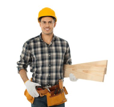 Handsome carpenter with wooden planks isolated on white