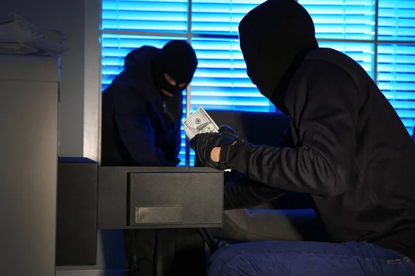 Thieves Taking Money Out Steel Safe Indoors Night — 스톡 사진