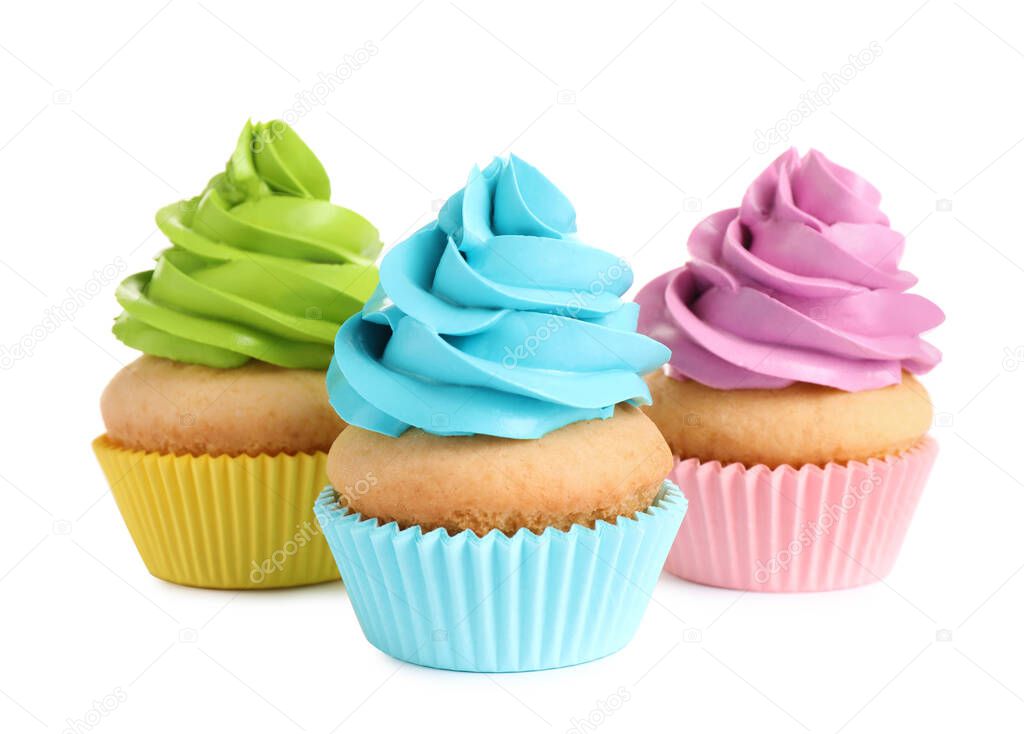 Delicious birthday cupcakes with buttercream on white background