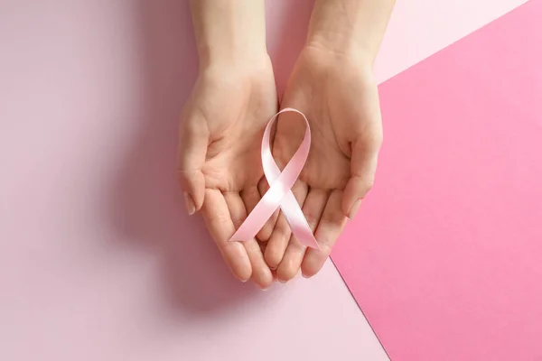 Woman Holding Pink Ribbon Color Background Top View Breast Cancer — Stock Photo, Image