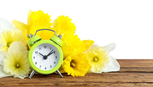 Green Alarm Clock Spring Flowers Wooden Table White Background Time — Stock Photo, Image