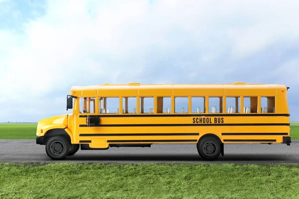 Yellow school bus on road outdoors. Transport for students