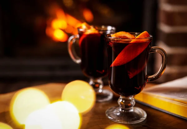 Tasty Mulled Wine Festive Lights Blurred Fireplace Background — Stock Photo, Image