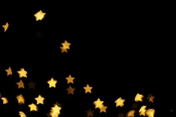 Vista Borrosa Las Luces Forma Estrella Sobre Fondo Negro Efecto —  Fotos de Stock