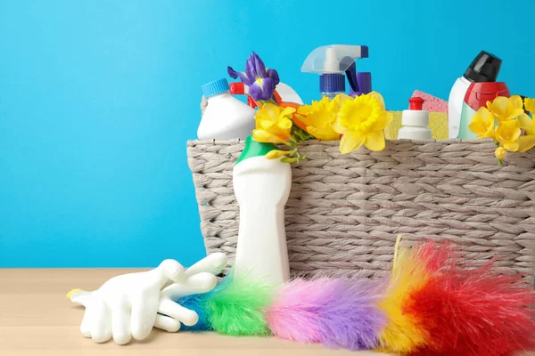 Wicker Basket Spring Flowers Cleaning Supplies Wooden Table — Stock Photo, Image