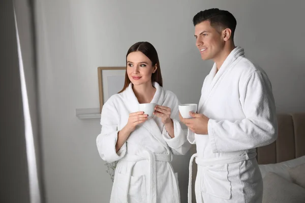 Happy Couple Wearing Bathrobes Window Room — Stock Photo, Image