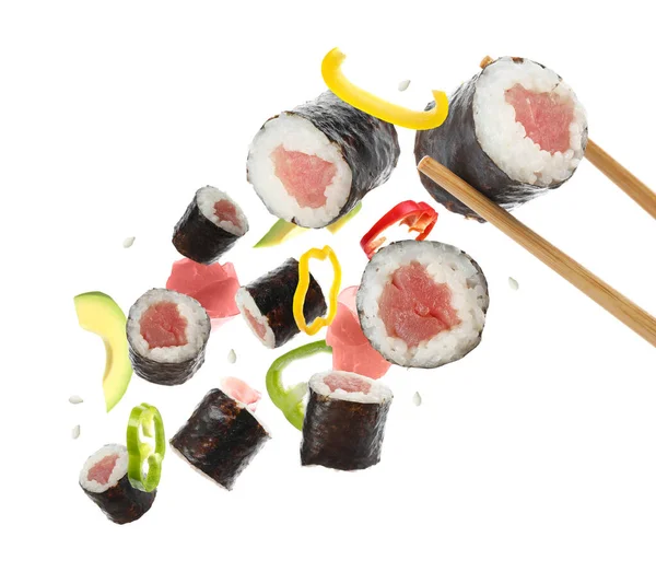 Sushi rolls with tuna and ingredients on white background