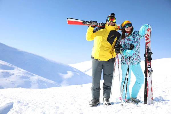 Young Couple Skis Hill Space Text Winter Vacation — Stock Photo, Image