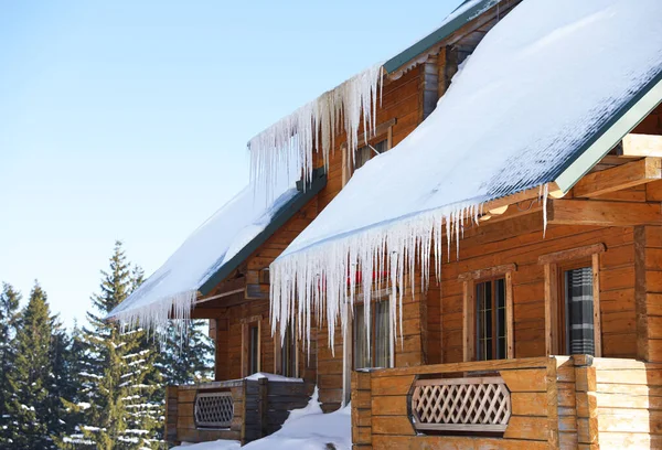 Modern Wooden Cottage Icicles Sunny Day Winter Vacation Royalty Free Stock Photos