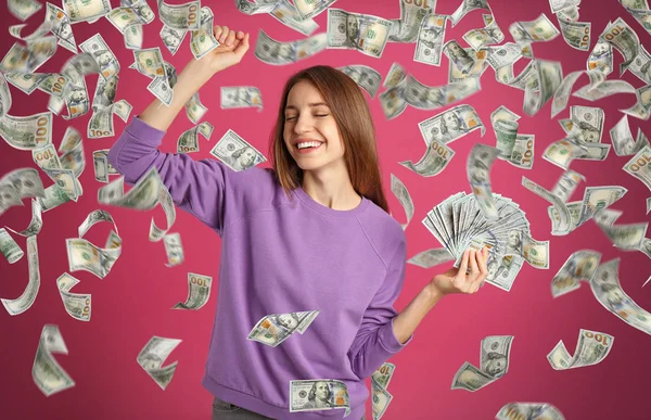 Mujer Joven Feliz Con Dólares Bajo Lluvia Dinero Sobre Fondo —  Fotos de Stock