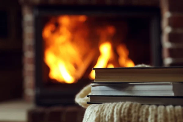 Books Table Burning Fireplace Space Text Reading Home — Stock Photo, Image