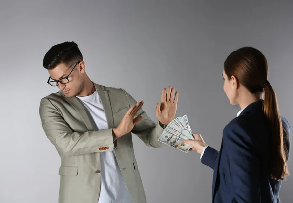 Man Refusing Take Bribe Grey Background — Stock Photo, Image
