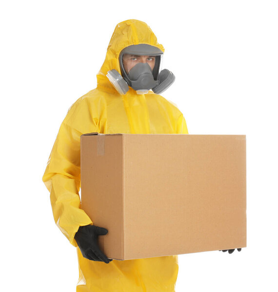 Man wearing chemical protective suit with cardboard box on white background. Prevention of virus spread