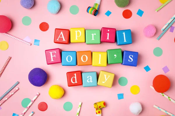 Colorful Cubes Words April Fool Day Pink Background Flat Lay — Stockfoto