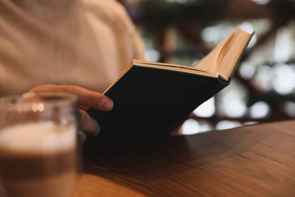 Man Reading Book Wooden Table Closeup — Stock Photo, Image