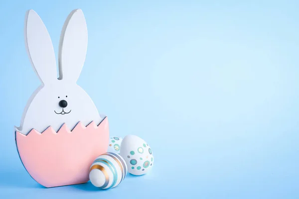 Easter Bunny Figure Decorated Eggs Light Blue Background Space Text — Stock Photo, Image