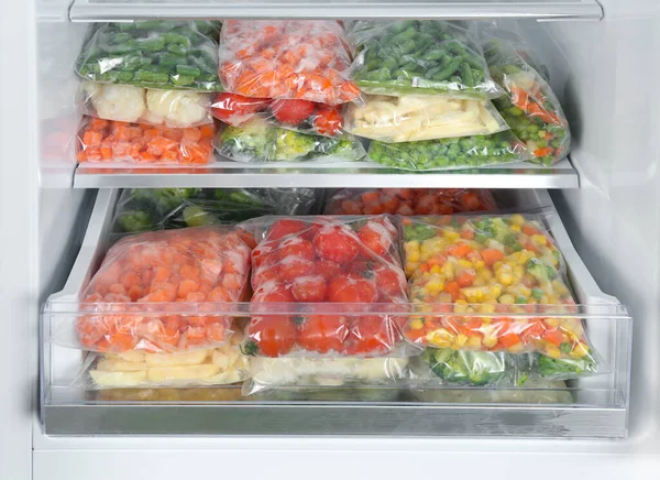 Plastic Bags Different Frozen Vegetables Refrigerator — Stock Photo, Image