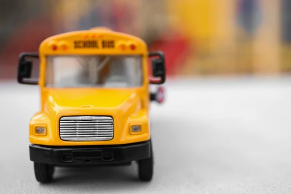 Closeup View Yellow Toy School Bus Outdoors Space Text Transport — Stockfoto