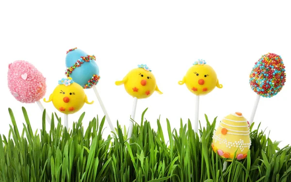 Different Sweet Cake Pops Easter Celebration Grass White Background — Stock Photo, Image