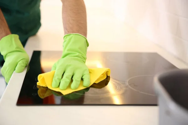 Professional Young Janitor Cleaning Stove Kitchen Closeup — Stock Photo, Image