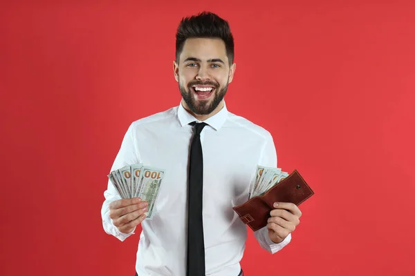 Emotional Young Man Money Wallet Crimson Background — Stock Photo, Image