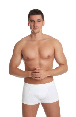 Beyaz arka planda seksi vücutlu bir adam.