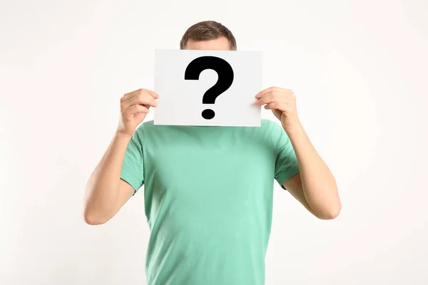 Man Holding Paper Question Mark White Background — Stock Photo, Image