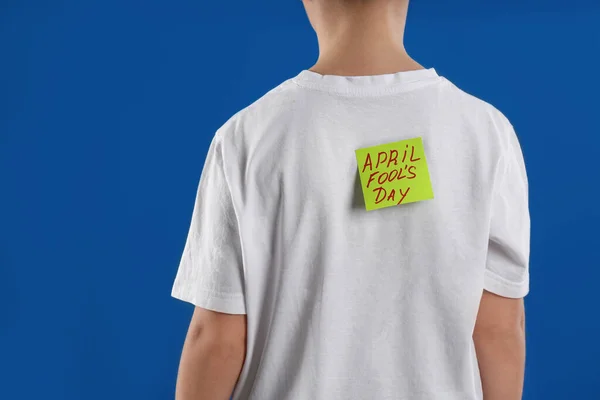 Preteen Boy April Fool Day Sticker Back Blue Background Closeup — Stock Photo, Image