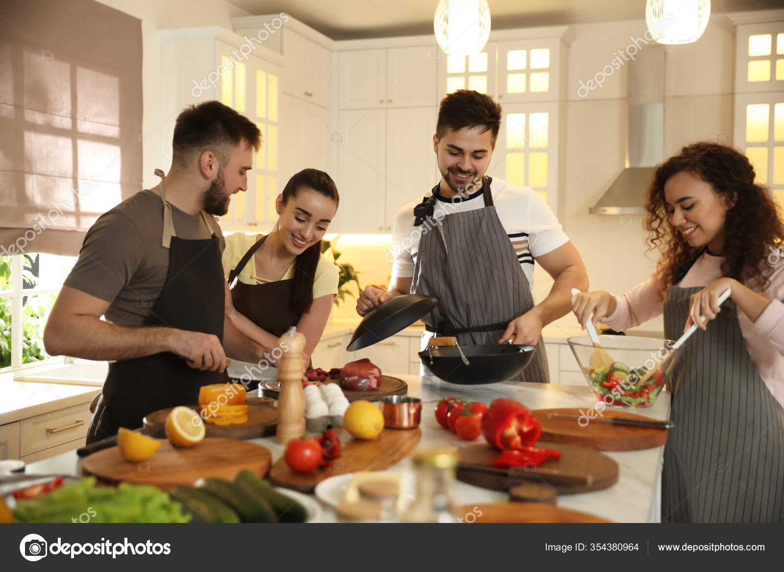 Happy People Cooking Food Together Kitchen Stock Photo by ©NewAfrica
