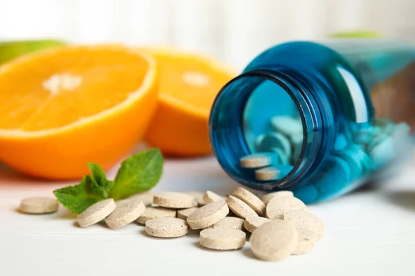 Bottle Vitamin Pills Orange White Wooden Table Closeup — Stock Photo, Image