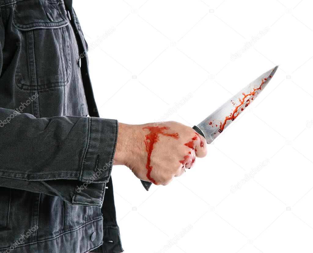 Man with bloody knife on white background, closeup. Dangerous criminal