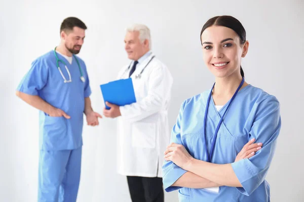 Young Doctor Colleagues Light Background — Stock Photo, Image