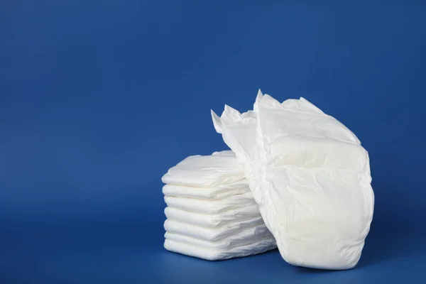 Stack Diapers Blue Background Space Text — Stock Photo, Image