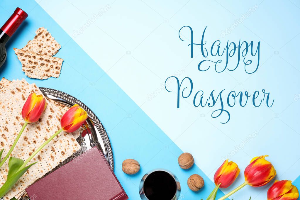 Flat lay composition with symbolic Pesach (Passover Seder) items on blue background,