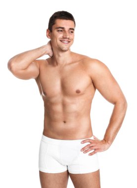 Beyaz arka planda seksi vücutlu bir adam.