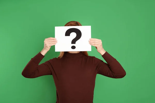 Woman Holding Question Mark Sign Green Background — Stock Photo, Image