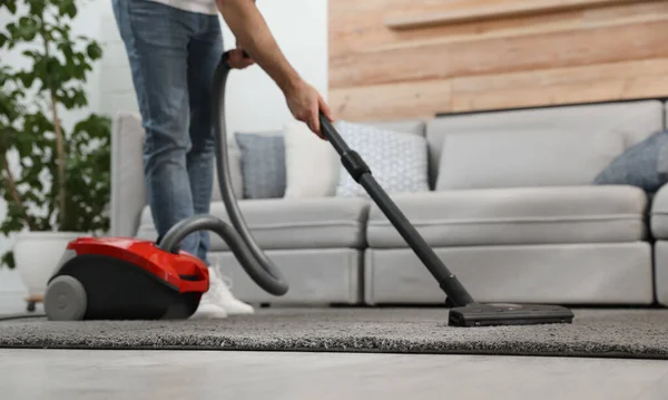 Young Man Using Vacuum Cleaner Home Closeup — Stock Photo, Image
