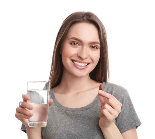 Wanita Muda Dengan Pil Vitamin Dan Segelas Air Dengan Latar — Stok Foto