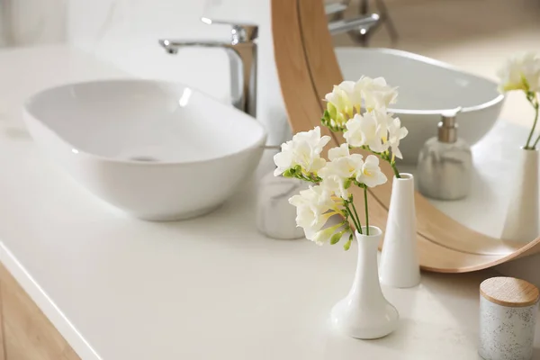 Beautiful White Freesia Flowers Counter Top Bathroom Space Text — стоковое фото