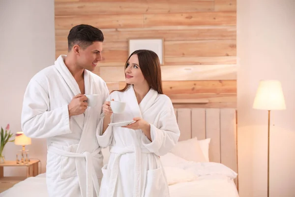 Happy Couple Bathrobes Coffee Bedroom — Stock Photo, Image