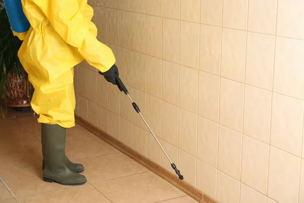 Pest Control Worker Spraying Pesticide Indoors Closeup Space Text — Stock Photo, Image