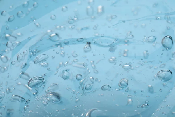 Amostra Gel Cosmético Azul Claro Como Fundo Close — Fotografia de Stock