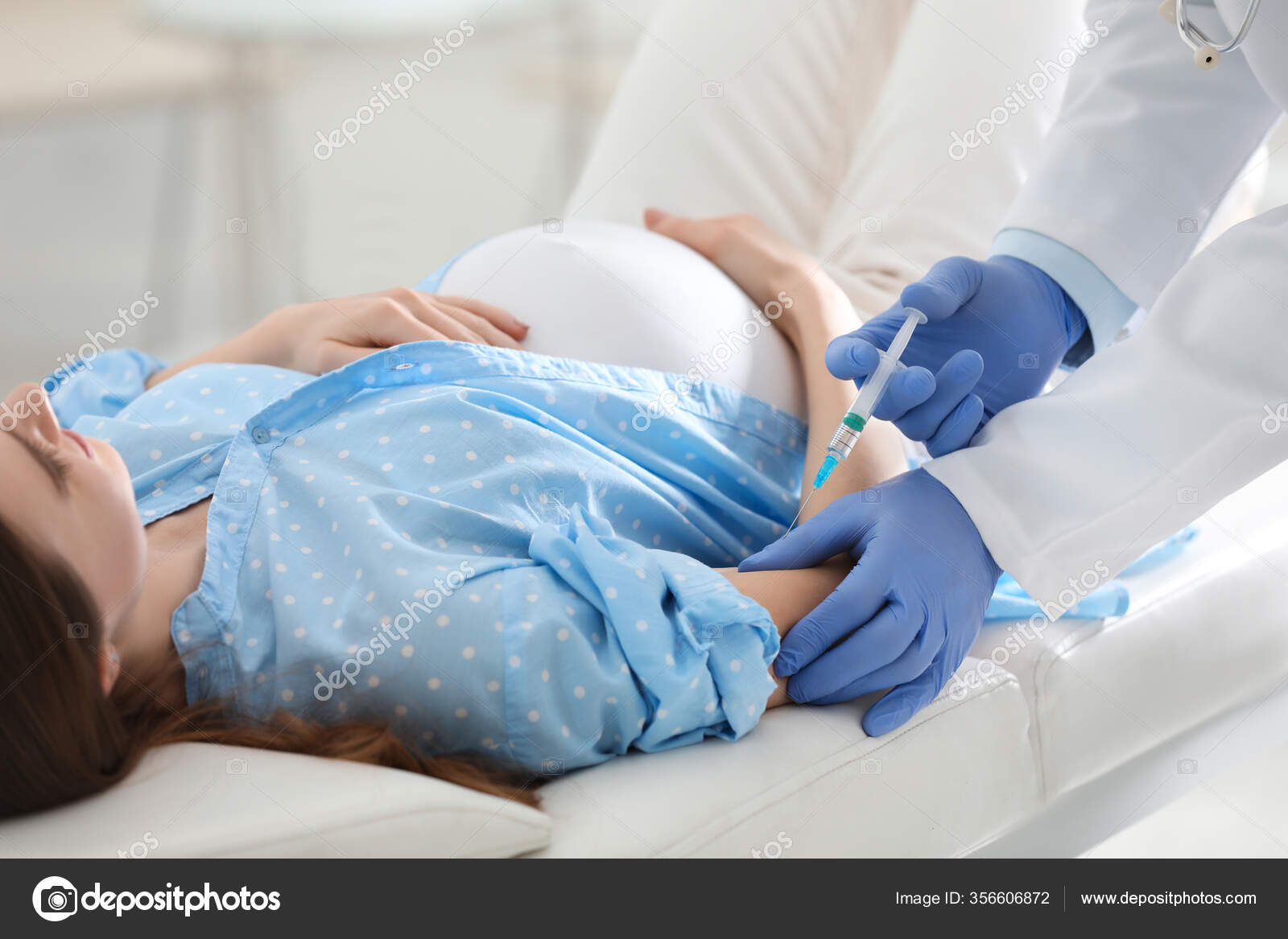Doctor Giving Injection Pregnant Woman Hospital Closeup Vaccination
