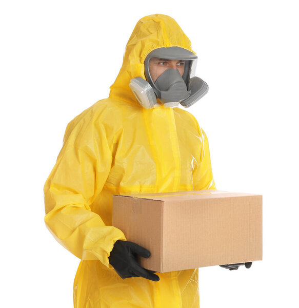 Man wearing chemical protective suit with cardboard box on white background. Prevention of virus spread